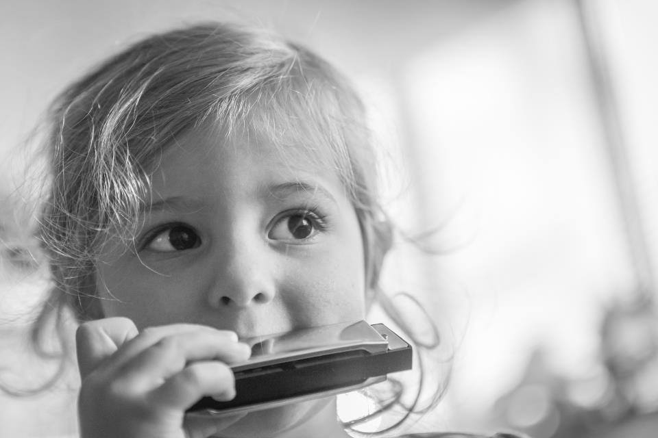 Playing the harmonica