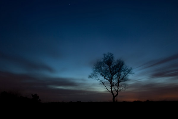 Landschap na zonsondergang