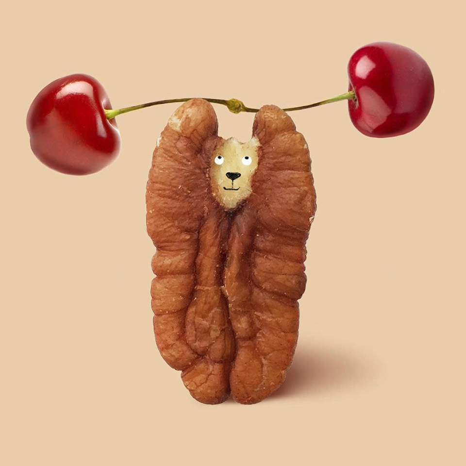 Helga A weightlifting bear made with a walnut and cherries Helga A weightlifting bear made with a walnut and cherries