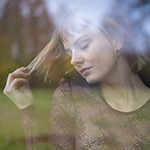 Portretfotografie tip: de weerspiegeling van een raam gebruiken