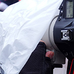 Sportfotografie tip: Regenhoes voor camera en objectief