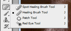 Selecteer de Healing brush tool