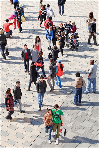 People walking at The Village Square